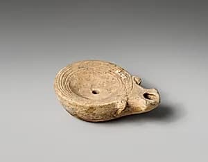 Terracotta oil lamp by Unknown Artist