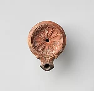 Terracotta oil lamp by Unknown Artist