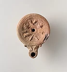 Terracotta oil lamp by Unknown Artist