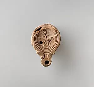 Terracotta oil lamp by Unknown Artist