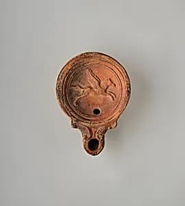 Terracotta oil lamp by Unknown Artist