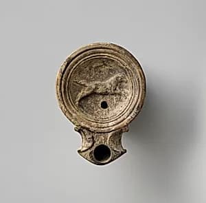 Terracotta oil lamp by Unknown Artist