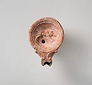 Terracotta oil lamp by Unknown Artist