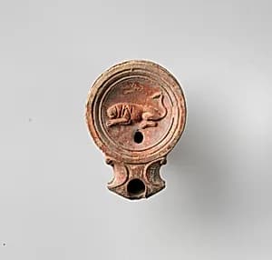 Terracotta oil lamp by Unknown Artist