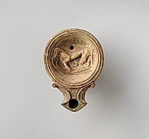 Terracotta oil lamp by Unknown Artist