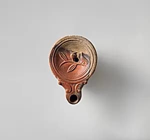 Terracotta oil lamp by Unknown Artist