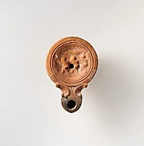 Terracotta oil lamp by Unknown Artist