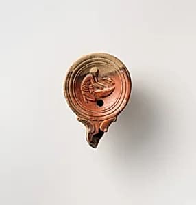 Terracotta oil lamp by Unknown Artist