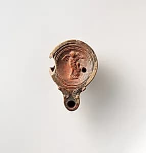 Terracotta oil lamp by Unknown Artist