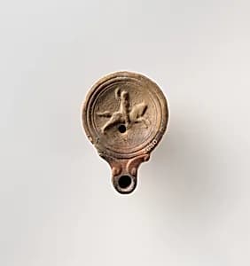 Terracotta oil lamp by Unknown Artist