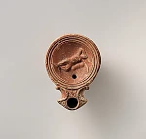 Terracotta oil lamp by Unknown Artist