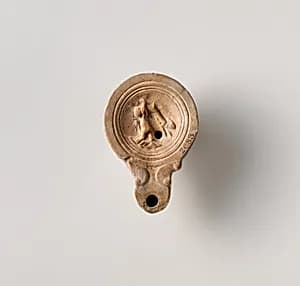 Terracotta oil lamp by Unknown Artist