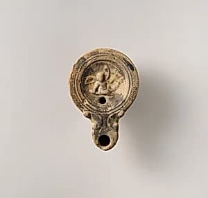Terracotta oil lamp by Unknown Artist