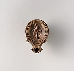 Terracotta oil lamp by Unknown Artist