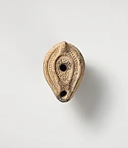 Terracotta oil lamp by Unknown Artist