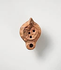 Terracotta oil lamp by Unknown Artist