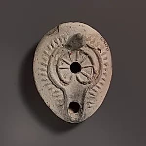 Terracotta oil lamp by Unknown Artist