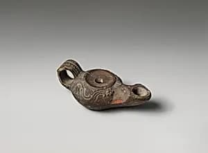 Terracotta oil lamp by Unknown Artist