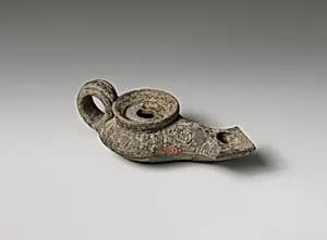 Terracotta oil lamp by Unknown Artist