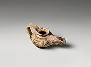 Terracotta oil lamp by Unknown Artist