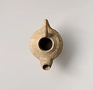 Terracotta oil lamp by Unknown Artist
