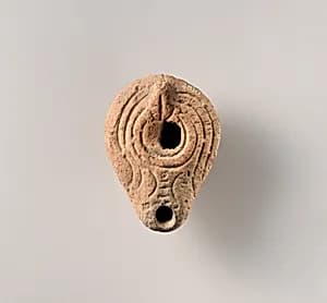 Terracotta oil lamp by Unknown Artist