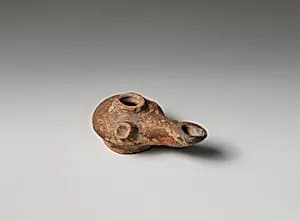 Terracotta oil lamp by Unknown Artist