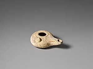 Terracotta oil lamp by Unknown Artist