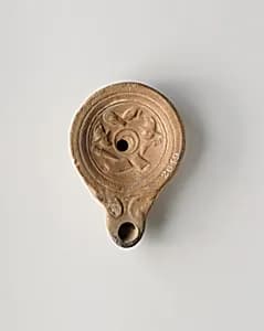 Terracotta oil lamp by Unknown Artist
