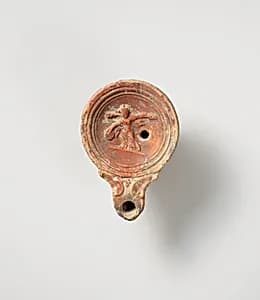 Terracotta oil lamp by Unknown Artist