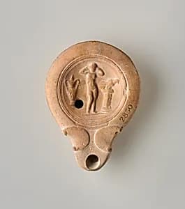 Terracotta oil lamp by Unknown Artist