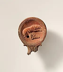 Terracotta oil lamp by Unknown Artist