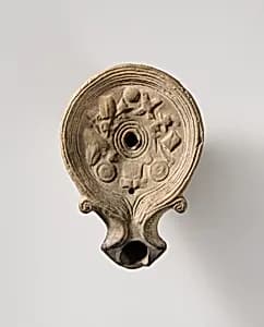 Terracotta oil lamp by Unknown Artist