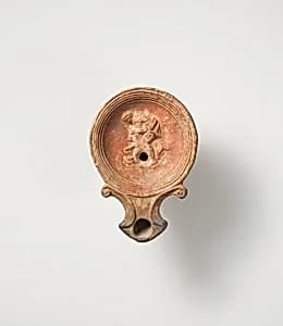 Terracotta oil lamp by Unknown Artist