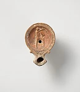Terracotta oil lamp by Unknown Artist