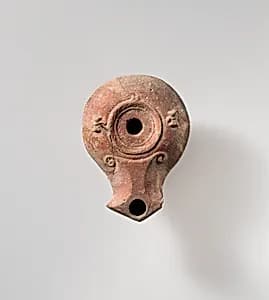 Terracotta oil lamp by Unknown Artist