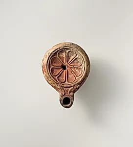 Terracotta oil lamp by Unknown Artist