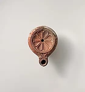 Terracotta oil lamp by Unknown Artist