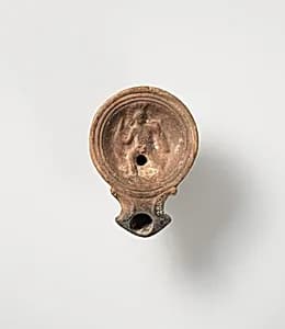 Terracotta oil lamp by Unknown Artist