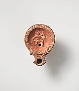 Terracotta oil lamp by Unknown Artist