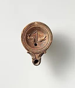 Terracotta oil lamp by Unknown Artist