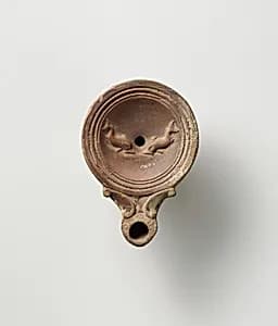 Terracotta oil lamp by Unknown Artist