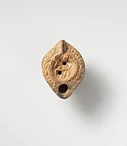 Terracotta oil lamp by Unknown Artist
