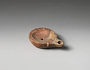 Terracotta oil lamp by Unknown Artist