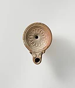 Terracotta oil lamp by Unknown Artist