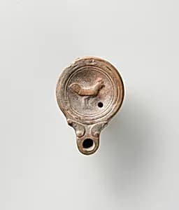 Terracotta oil lamp by Unknown Artist