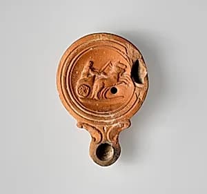 Terracotta oil lamp by Unknown Artist