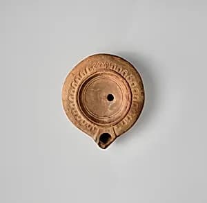 Terracotta oil lamp by Unknown Artist