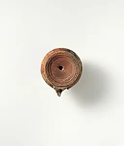 Terracotta oil lamp by Unknown Artist