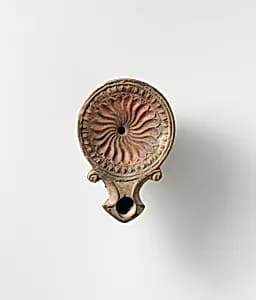 Terracotta oil lamp by Unknown Artist